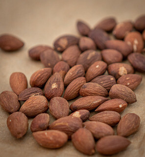 <p>Start by soaking the dates in boiling water for 5 minutes.</p><p>Preheat oven to around 180 degrees and roast the almonds for around 8 minutes or until slightly dark in colour. Save the ¼ cup for toppings (chopped them up roughly)</p>