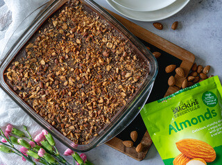 <p>Pour over the mixture, sprinkle with chopped almonds gently pushing them into the chocolate.</p><p>Pop it back in the fridge for an hour or so. Take out and slice into bars; devour</p>