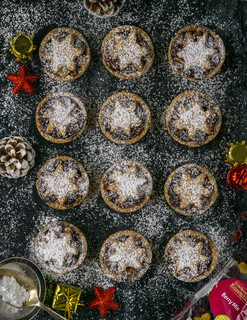 <p>Next take the dough, leave a small bit of the dough on the side to create the star shapes to put on the top.</p><p> </p><p>Grease your mince pie tray (or muffins tray) and form the dough into balls. Press each ball in the mould making sure all the edges are of the same height.</p><p> </p><p>Divide the filling equally and place in the moulds so it reaches just below the edge of the mould. Take the dough bit you left for the star, roll it out, then cut out your stars and place the tops lightly on the mincemeat.</p>