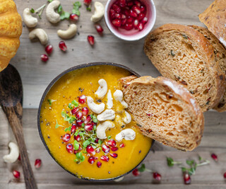 <p>Serve with extra cashews, fresh pomegranate jewels, watercress and crusty seeded bread</p>